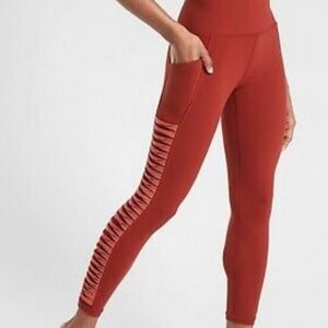 Athleta Salutation Stash Pocket II Twist 7/8 Tights Russet Brown Orange Chevron